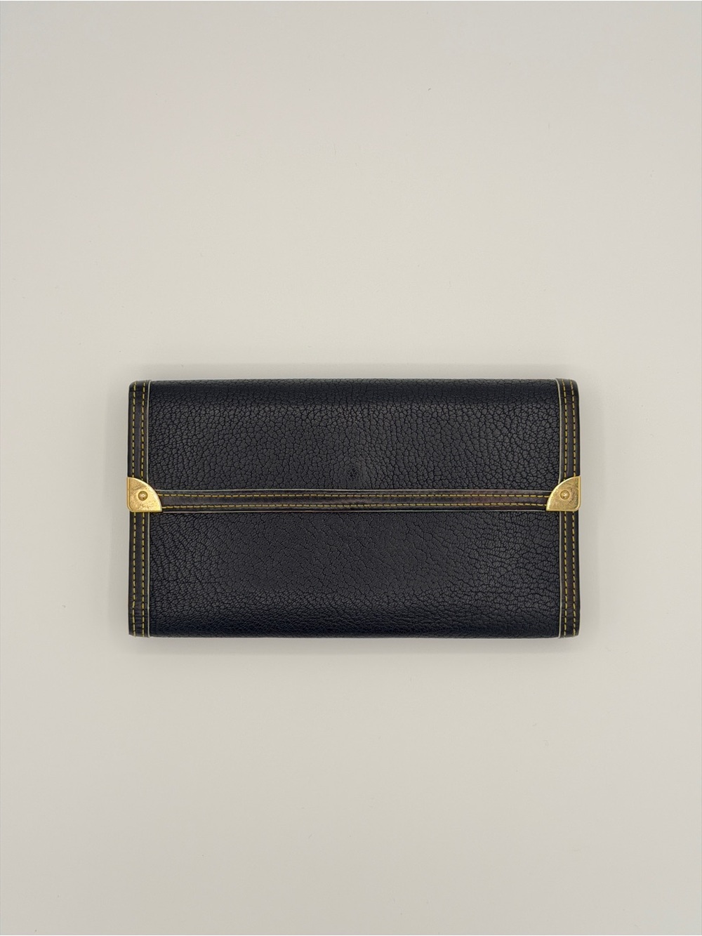 Louis Vuitton Suhali Porte Trésor International Wallet black goat leather